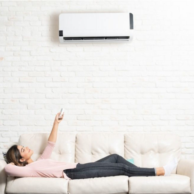 girl with new mini split ductless ac