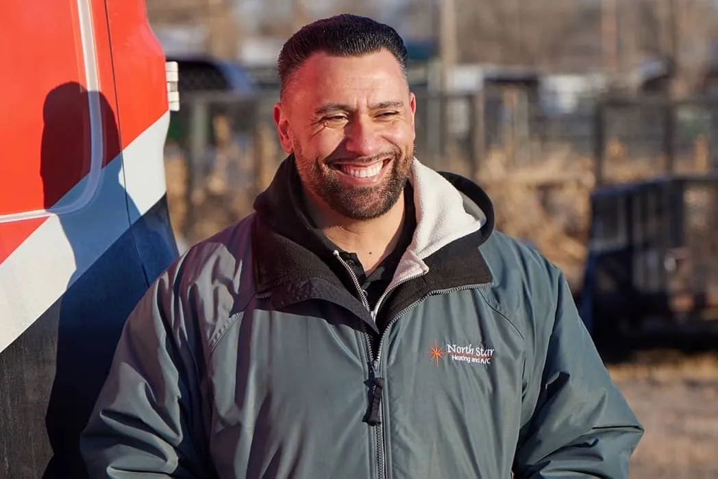 Smiling North Star HVAC technician in uniform