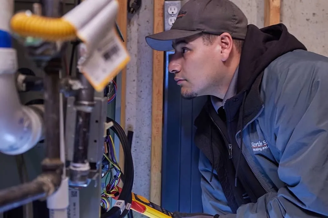 Plumber checking connections