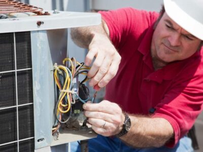 man fixing ac service