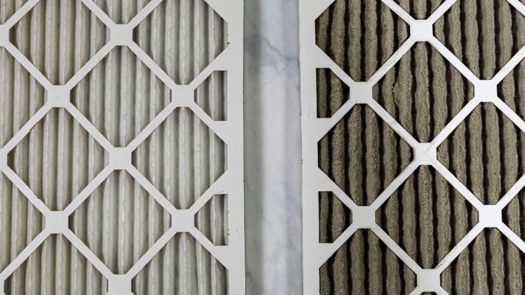 before and after picture of HVAC filters. Winterize your furnace by cleaning your filters