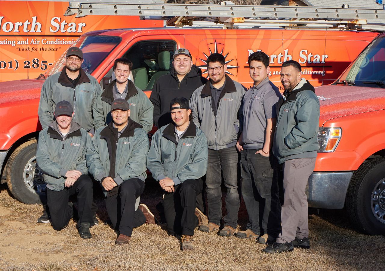 The North Star Heating & Air Conditioning company HVAC team. Standing in front of our fl